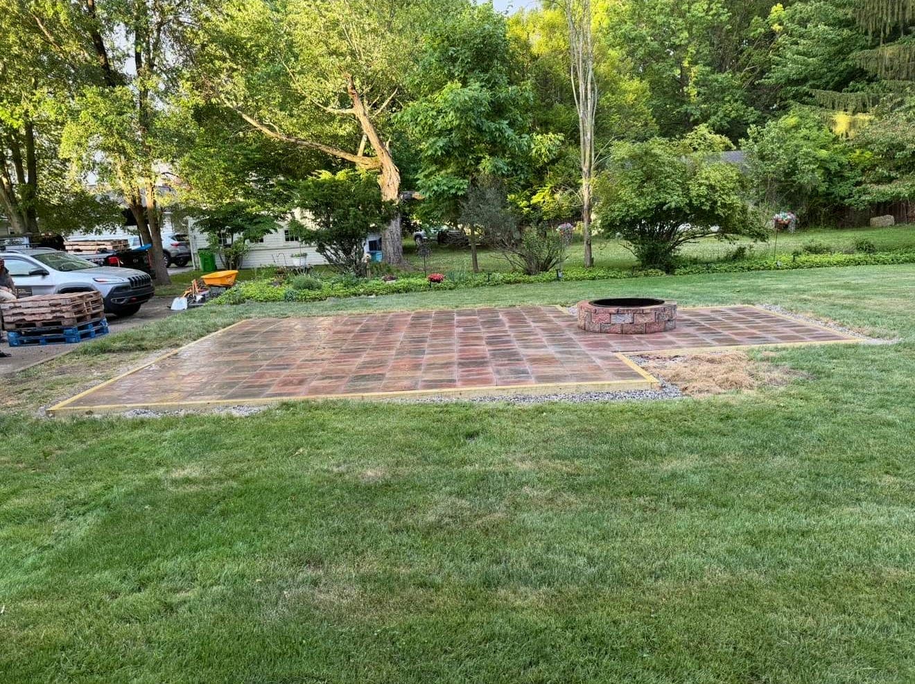New paver patio with fire pit